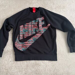 Nike Men's Black Crewneck Sweater with Vibrant Logo